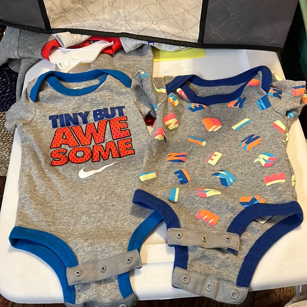 2 Nike 0/6 month onesies